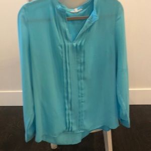 Turquoise blouse with V neck